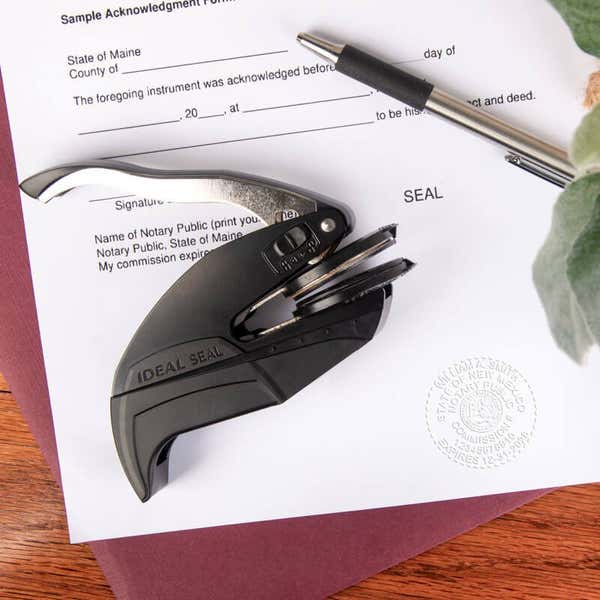 An Embosser and Embosser Impression on a Document