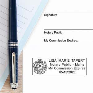 Another example of the Maine Notary Pink Stamp - Rectangle impression on white paper