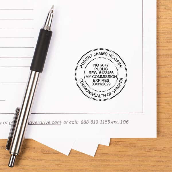 Virginia notary stamp impression showing name, registration number, and expiration date.