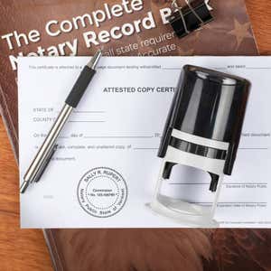 Official notary impression on attested record form with stamp body beside it