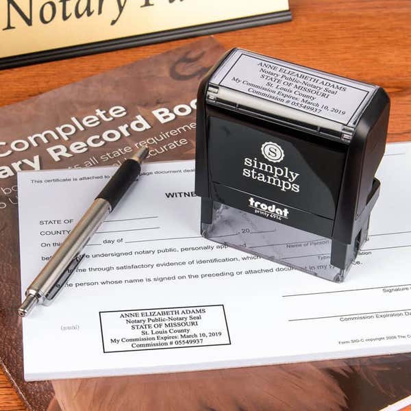 Missouri Notary Rectangle stamp body next to impression on notary document