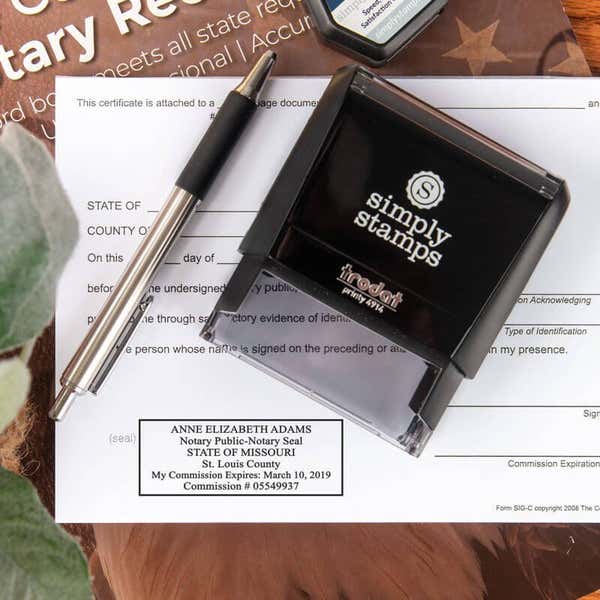 Missouri Notary Rectangle impression next to stamp body overhead shot