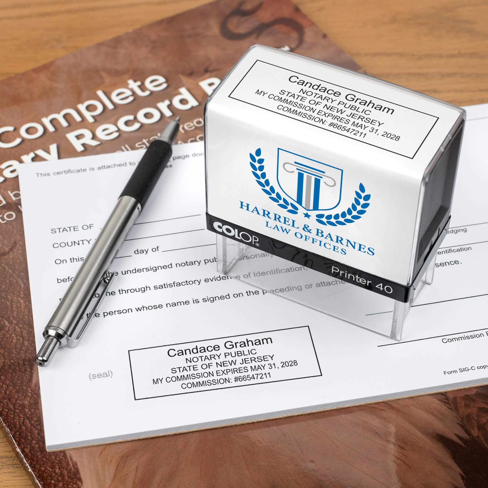 The Custom New Jersey Notary Stamp for a law office being used on a small document