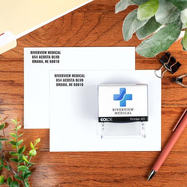Medical office address stamp impression on two envelopes
